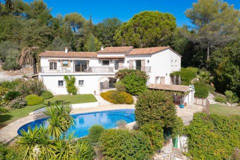 Large Family Home with Open View... In a dominant position, near Valbonne and shops, charming Provencal-style house out of sight. Ideal for entertaining family and friends, this house offers very beautiful volumes, 7 bedrooms including a guest apartm...