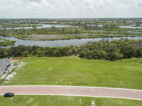 WOW-- a 1 acre lot located on the Manatee River that flows diectly to the Gulf of Mexico. Property is deeded to have 2 boat docks. Owner purchased 2 separete lots but is now selling them as one big lot right on the river. The Islands has it's own clu...