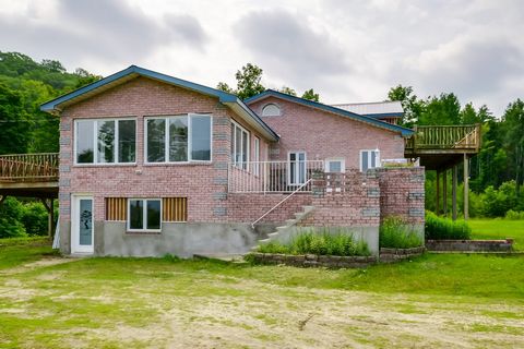 Very private 38-acre domain. Last property on the road, this domain is surrounded by crown lands and bordered on the front by Lac Brochet. There are also 3 artificial lakes used a long time ago for fish farming as well as a small pond, an oversized i...