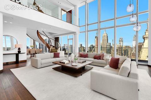 At the pinnacle of One Madison, the Triplex Penthouse spans almost 7,000 square feet of expansive living space from the 58th to the 60th floor. The striking double-height windows offer panoramic 360-degree vistas of the skyline and both the East and ...