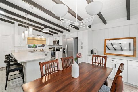 Discover elegance in Kailua with this renovated 4-bedroom, 2-bath home, blending style and practicality. Energy-savvy living with 30 owned PV panels reduces utility costs. Features include a private landscaped backyard, large driveway plus a garage w...