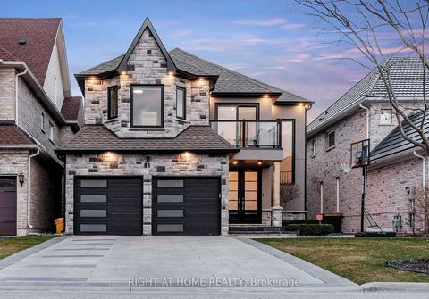 Welcome to 81 Verdi Rd, where modern luxury meets serene surroundings in Oak Ridges. This fully remodelled home features 4300 sq ft of living space and boasts exquisite features, including a quartz fireplace in the cozy living room, a chef's kitchen ...