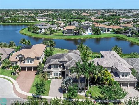 Stunning Two-Story pool home on huge lot w/lake views in exclusive Seven Bridges. Plenty of space w/ 5 Beds + Library + Loft + Media Room & Game Room. 5 full & 2 half baths. Gorgeous Estate Residence w/ large impact windows that bring lots of natural...