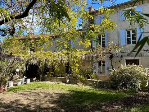 Ref 466 NCH Région Grignan, Enclave des Papes in the center of the Drôme Provençale, close to the center of the village, quiet, house of character and charm with its beautiful and large walled and wooded garden, a closed and secluded pool area. Beaut...