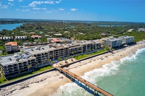 Experience the epitome of luxury with this oceanfront condo! The modern kitchen features bright cabinetry, stainless steel appliances, a large island, & stylish recessed lighting complete with a convenient bar counter & wine cooler for entertaining g...