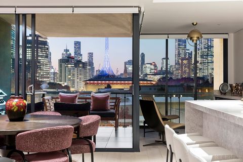 Indulge in luxury living at this exceptional 5th-floor apartment in The Melburnian, perfectly poised to take in breathtaking views within an iconic complex. Renovated to perfection by renowned architects Studio Tate, this residence sets a new standar...