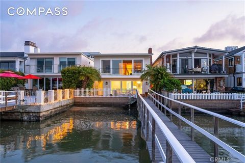 Ideally located right on the bay with a private dock and enchanting views, this upgraded Balboa Peninsula duplex offers outstanding opportunities in Newport Beach. Featuring an elevator and interior and exterior staircases, the two-level property can...