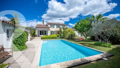This welcoming 4-bedroom family home occupies a privileged and discreet position, conveniently located less than 10 minutes' walk from the centre of the charming village of Mouriès. The generous and bright interior, which includes a ground floor bedr...