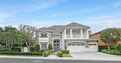 Stunning home in the heart of Coto De Caza! Not a detail was missed in this 6 Bedroom, 4.5 bath with a bonus room home in the Oak Knoll tract. This home boasts a single-loaded street with a super-private oversized lot with a pool, spa, grassy area, a...