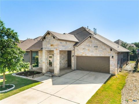 Don't miss this cozy yet airy home with magnificent high ceilings, four true bedrooms, two living areas, and three full baths all within walking distance to Rancho Sienna Elementary School! The master bedroom has a generous walk-in closet and private...