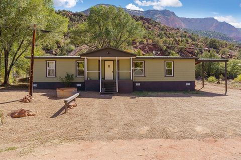 Jemez Mountain Home is move in ready and could be all yours! Location & Views !3 Bedrooms, 2 full baths, spacious living & dining areas complete with a wood burning stove for cozy nights. Charming Country Kitchen, with Island, cafe dining and built i...
