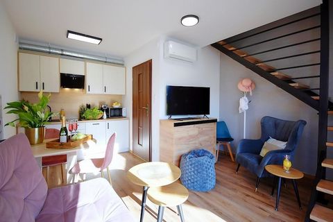 On the edge of a charming seaside settlement, there is a family holiday resort, which offers accommodation in two-story terraced houses and plenty of green space for children to play various games and have fun. Two-story holiday homes with terraces a...