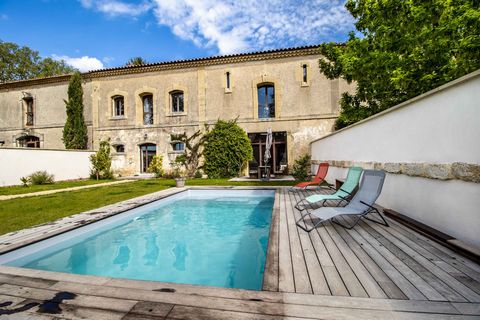 Old winery of 250m² from the 1900s completely renovated in a contemporary style keeping its original elements to which are added 57m² of outbuildings including a large office and two technical rooms. Built in a 1000m² plot with two terraces: on the s...