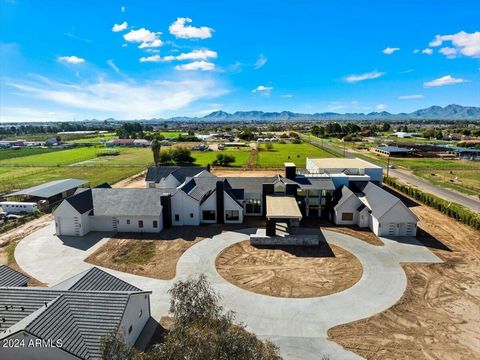 Experience the stately life where Gilbert, Mesa & Queen Creek intersect! Where every family's dream home becomes reality! This 5 acre guard gated equestrian compound under construction for 3 years, completed in Q3, can still be customized and made yo...