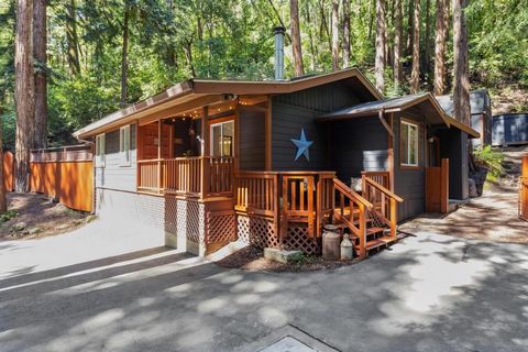 Discover the rustic charm & modern comfort at 10243 East Zayante Rd, nestled in the majestic redwoods of Felton. This 2-bed, 1.5 -bath home sits on a picturesque 15k+ sq ft lot spread across three parcels. Step onto the inviting front porch & imagine...