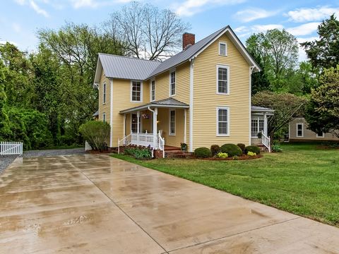 Built in 1900, this charming home is ideally located a very short distance from downtown Cornelius with shopping, dining, and the Cain Center for the Arts! Featuring multiple covered rocking chair porches, period wood floors, 9.5-foot ceilings on the...
