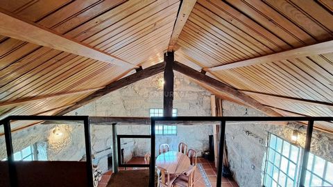 Near the village of Tábua, in the town of Ázere, there is for sale a small stone house ready to move in, recovered with rustic details. It is presented in a cozy atmosphere, living room and kitchen in open space, bedroom in mesa and stone walls contr...