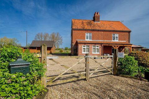 On the outskirts of the sought-after village of Horningtoft and standing on a plot of approximately half an acre (STS), this stunning Norfolk red brick family home is surrounded by wonderful grassy meadows and natural woods. Formed from the combinati...