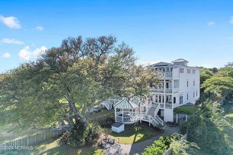 Nestled along the picturesque Intracoastal Waterway with breathtaking views of Masonboro Island and the Atlantic Ocean, this luxurious Charleston-style retreat epitomizes coastal living at its finest. Featuring five bedrooms and five bathrooms, this ...