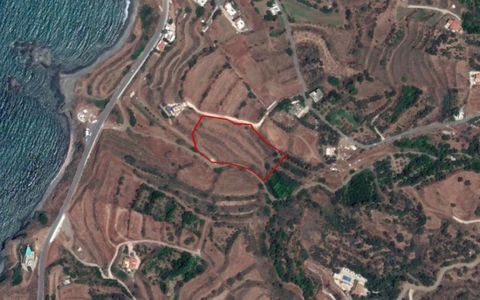 Plot for sale in Pomos, Paphos. The plot has an area of 7,693sqm, has an irregular shape with a smooth sloping surface, and benefits from c. 8m road frontage along its northern border. The immediate area comprises scattered residential developments a...