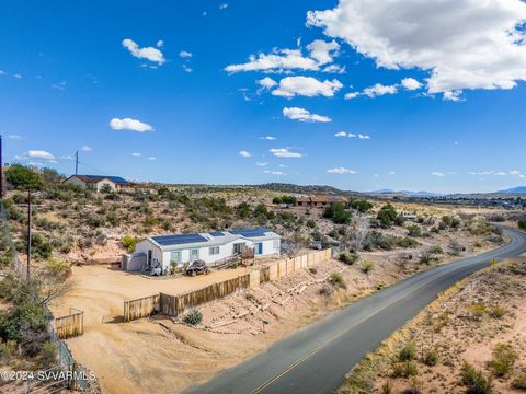 Welcome to the heart of Arizona's stunning Verde Valley. Enjoy privacy on 1.19 acres of fully fenced horse property, offering panoramic views of Mingus Mt, historic Jerome, & more!NO HOA or rental restrictions. This charming home features 3 generousl...