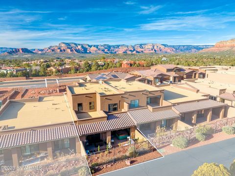 Opulence awaits, this 3 bedroom/3 bath home is dressed to the nines and the red rock views create a stunning backdrop for your Sedona life. An ideal location in an upscale gated community offers you a lifestyle of both luxury and convenience.Designed...