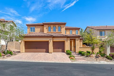 4 bedroom, 2 1/2 bath, 3 car garage on oversized lot in the Paseos at Summerlin with Strip and Mountain views. porcelain floors down, wood floors and new carpet up and grey two tone paint throughout and plantation shutters. Living room has build in c...