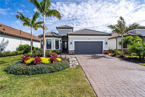 **MOTIVATED SELLER** Step inside your upgraded MOVE-IN READY home right in Esplanade Azario on a golf-deeded lot! The Lazio model is a meticulously designed home featuring an expansive open floor plan that seamlessly blends the living, dining, kitche...