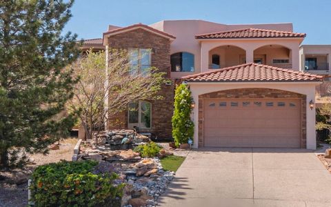 Do not miss this opportunity to own this Absolutely Incredible Custom Tuscan Home. Situated in a private gated community with breathtaking views of the Sandias. As you enter the open concept home through the custom iron arched front door you will be ...