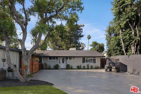 If Pottery Barn and Restoration Hardware had a baby, this would be their crowning achievement. Completely updated and flawlessly curated, this meticulously styled chic home in the heart of Woodland Hills sits on a huge gated lot, offering not only pr...