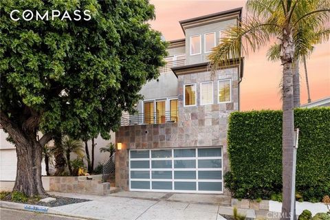 Welcome to 721 12th Street, an exquisite property with unbeatable walkability in the heart of Manhattan Beach. This home features an elevator, providing convenient access to all levels. The lower level, previously a separate studio, has been seamless...