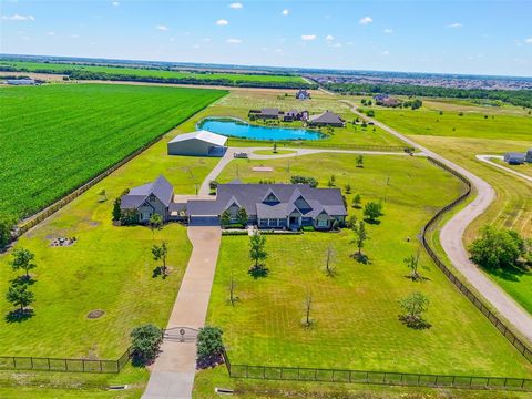 Can you say EXTRA, in a good way? OVER 15,000 SQUARE FEET UNDER ROOF! This luxury farmhouse on 6 acres with a custom open floorplan has hand scraped hardwoods, double islands, commercial appliances, exquisite master suite, an unheard of closet system...