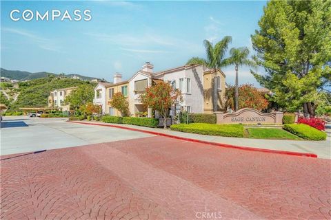Welcome to your new sanctuary in the sought-after Sierra Del Oro community, where every amenity and convenience awaits at your doorstep! This exquisite 2-bedroom, 2-bath retreat boasts a rare 1-car garage, a convenient carport, and an additional park...