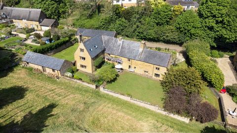 A historic Grade II listed Farmhouse, built with Hornton stone in a superb and very peaceful village setting, which comprises six bedrooms and three reception rooms which sits in over four acres of grounds to include a Motte and Bailey, which is a sc...
