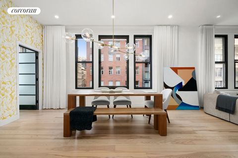 Enjoy modern living in a historic art deco pre-war building in this shining example of a Tribeca loft. - This gut-renovated two-bedroom, two-bathroom residence impresses with breathtaking proportions, classic prewar details, and designer style in a b...